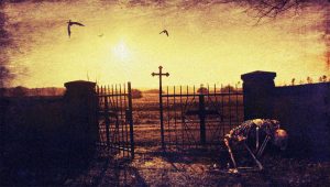 ein Skelett kniet vor einem Friedhof