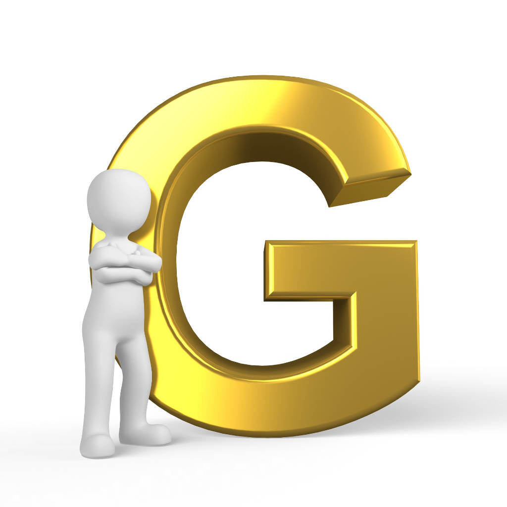 ein goldenes G, eine symbolisch menschliche Figur steht daneben